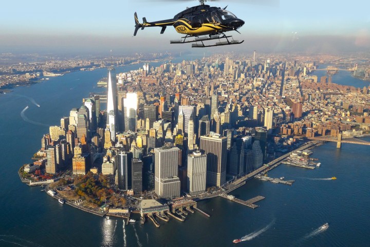 zip-aviation helicopter flying over empire state