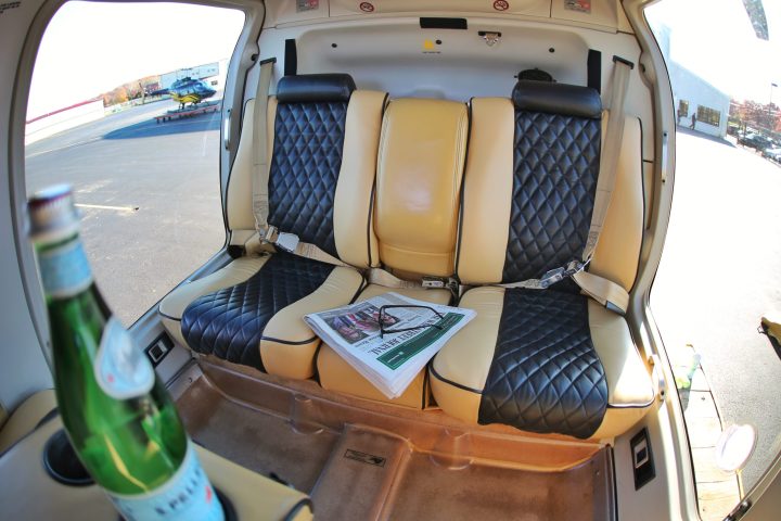 a desktop computer sitting on top of a car