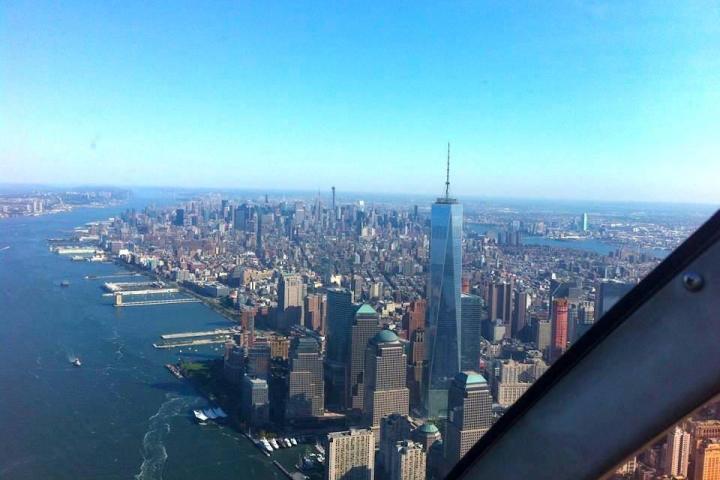 a view of a large body of water with a city in the background